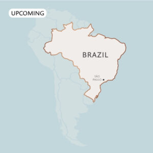 Map of South America highlighting Brazil, with a dot marking São Paulo. The word UPCOMING appears in a box above the map.