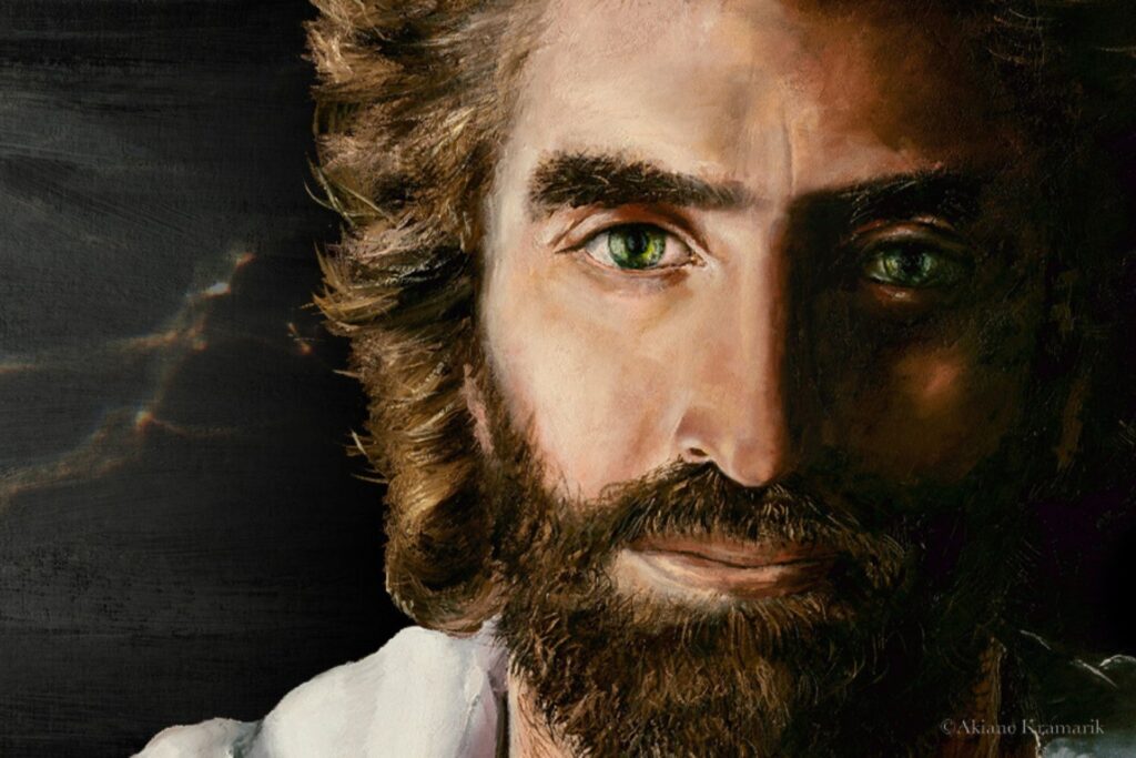 A detailed painting of Jesus with green eyes, a full beard, and shoulder-length brown hair. Light highlights part of his face, while the other side is in shadow. The background is dark.