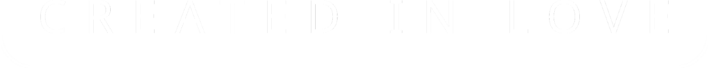 The words CREATED IN LOVE in white capital letters.